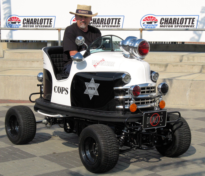 Tom doing laps on the NASCAR  track in Charlotte 